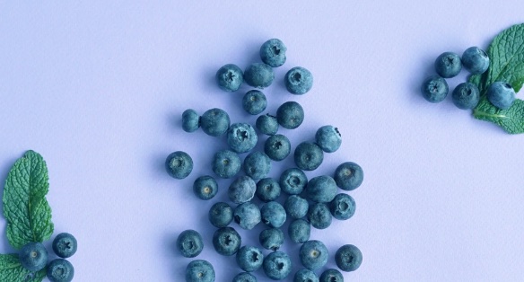 Sample post: blueberries and mint on lilac.