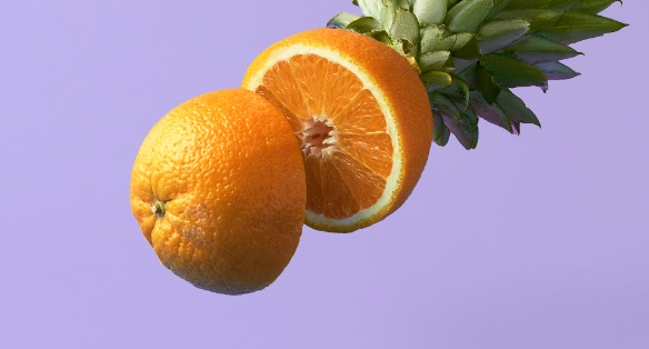 Sample post: an orange and a pineapple top on purple.